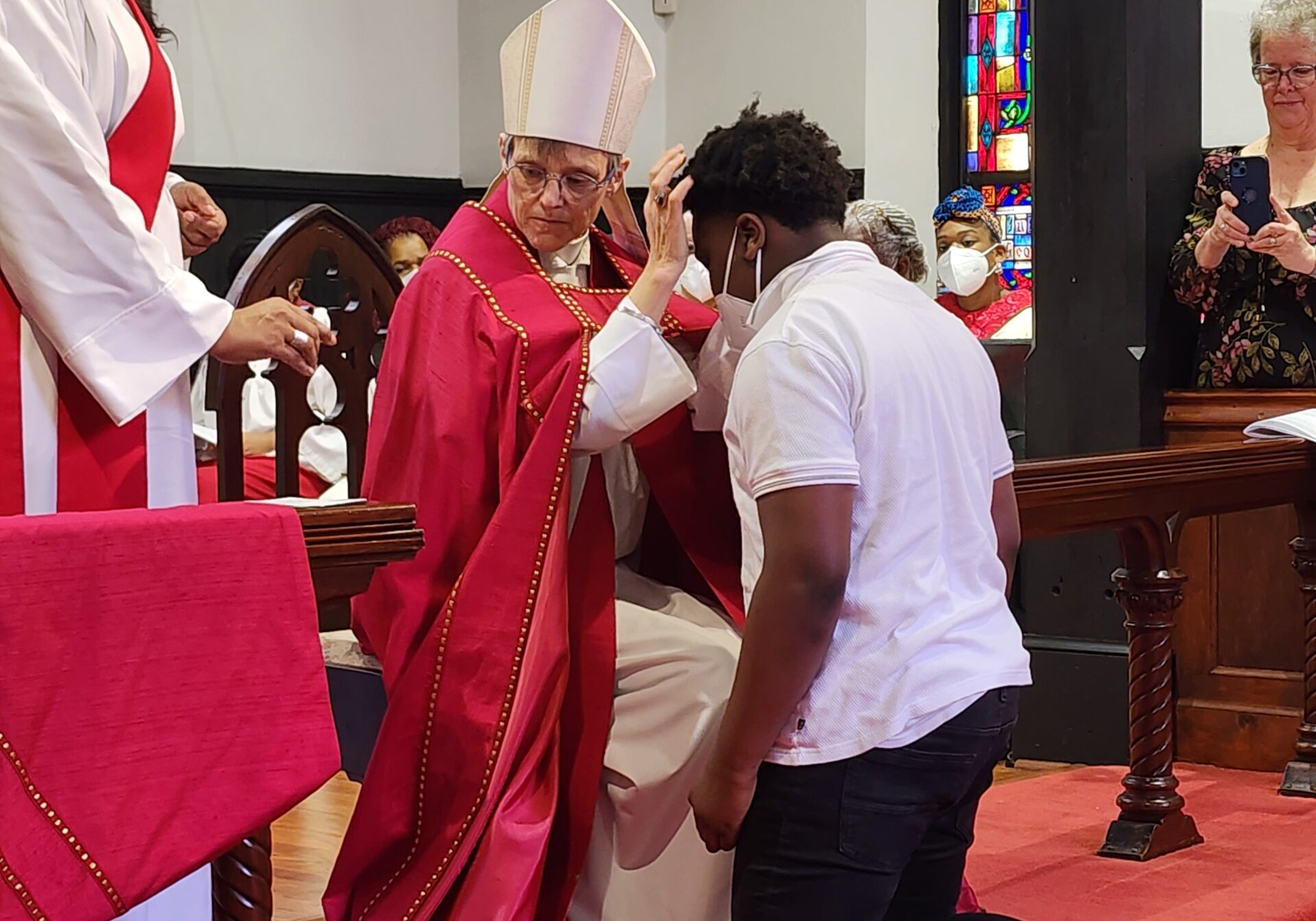 Kneeling youth for Confirmation